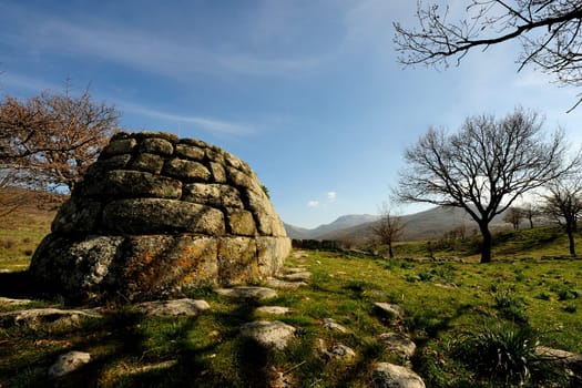 Giants' Tombs of Madau...The necropolis of Madau is located near the Nuraghe complex known as the Gremanu, a necropolis nuragica which is the plateau of Pratobello. Barbagia Ollolai in the middle of the valley of the riu Madau, in the direction of the step of Corru 'and Boi. The complex includes four burial tombs of the giants, made nuragica age, dating back to the Late Bronze-Late Bronze Age (1300-900 BC).