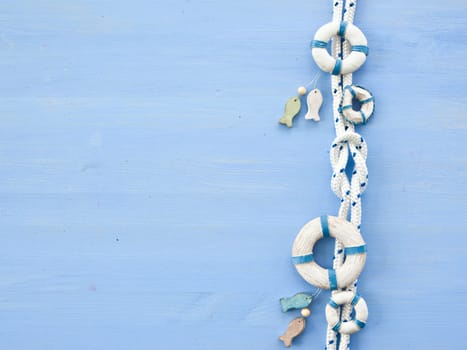 Maritime decoration and sailor knots on a blue background