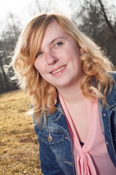 Portrait of a young woman on the field