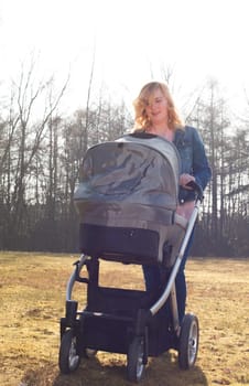 Mother and baby on a sunny day in the field