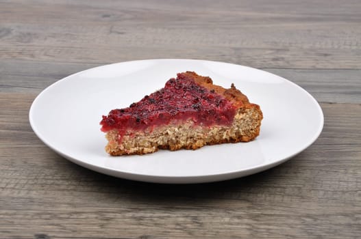 Currant cake on wood