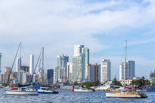 Boats and yachts in front of the modern section of Cartagena, Colombia