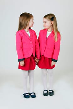 Two young girl ( sisters) in the studio