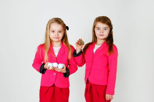 Two young girl ( sisters) in the studio