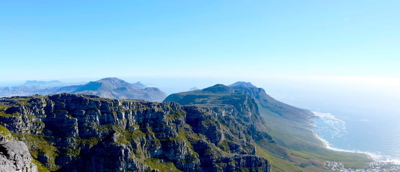 View over mountains and the ocean from the top of Table Mountain outside Cape Town in South Africa