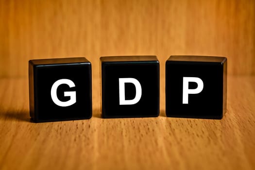 gross domestic product or GDP text on black block