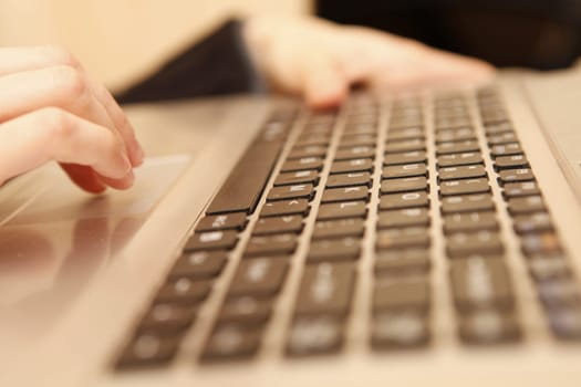 Close up photo of a gray laptop keyboard