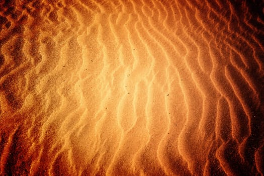 Beach with soft sand, rippled texture of windblown effect