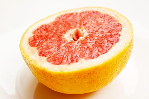 Fresh composition of yellow and red grapefruits.