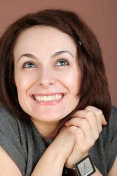 Portrait of a happy beautiful woman with green eyes.
