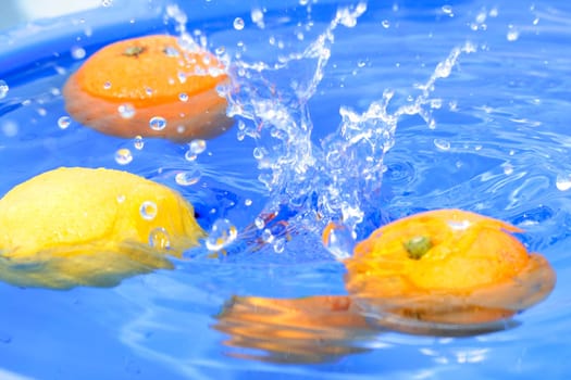 Oranges and lemons in water