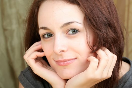 Beautiful happy woman with green eyes.