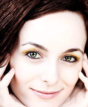 Beautiful happy woman with green eyes.