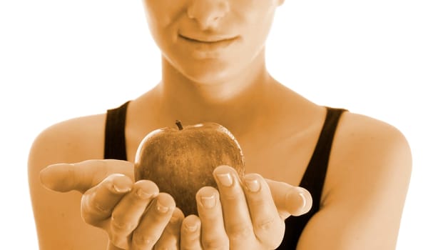 Beautiful young woman eating red apple. Isolated over white