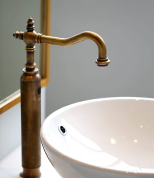 Faucet and sink close up shot for background mirror