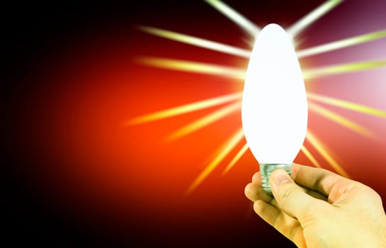 Light bulb in a man's hand