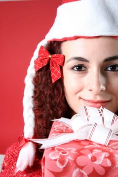 woman with a gift in her hands and snowflakes