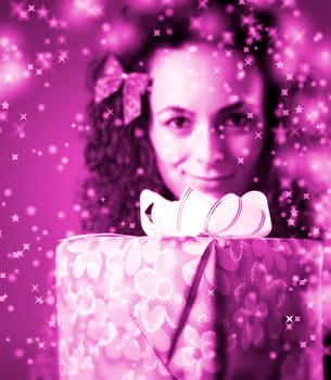 woman with a gift in her hands and snowflakes