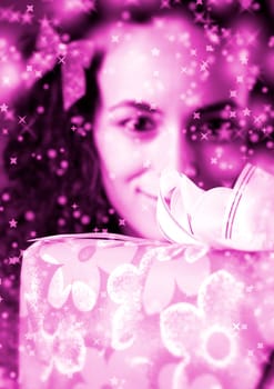 woman with a gift in her hands and snowflakes
