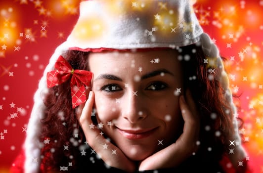 woman with a gift in her hands and snowflakes