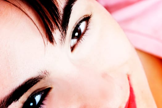 Closeup of beautiful young woman face.