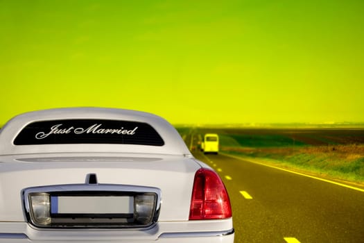 White limo on the road to happiness