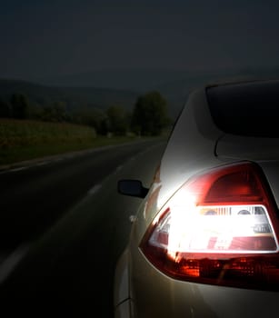 Silver car on the road