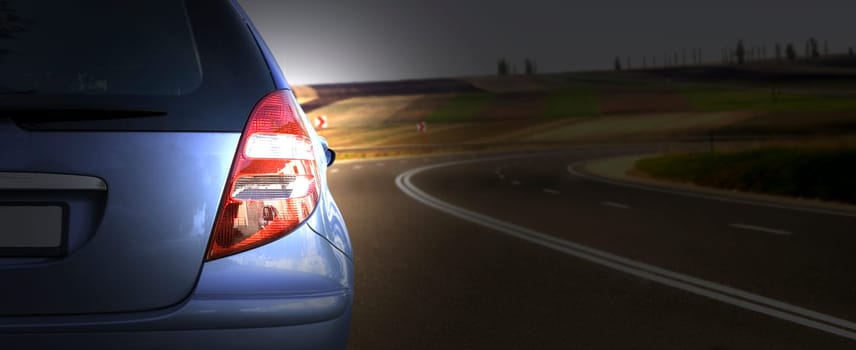 Car runing on the highway.