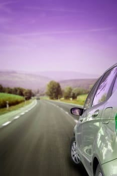 Car runing on the highway.