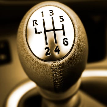 Close-up of a car gear lever.