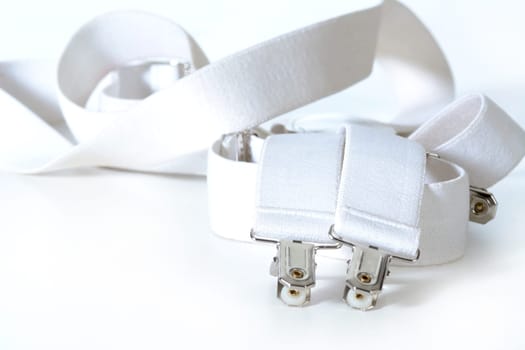 white suspenders isolated on white background