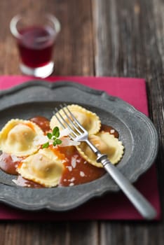 Ravioli pasta with red tomato sauce
