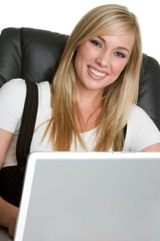 Beautiful smiling woman using laptop