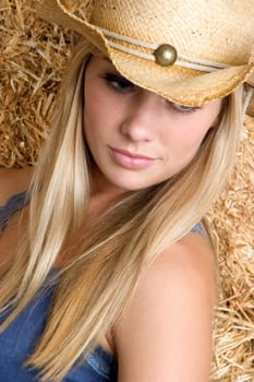 Beautiful blond cowgirl woman