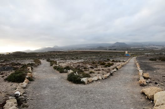 Travel Concept Background - Pathway in the Volcanic Desert Tenerife Canaty Islands Spain