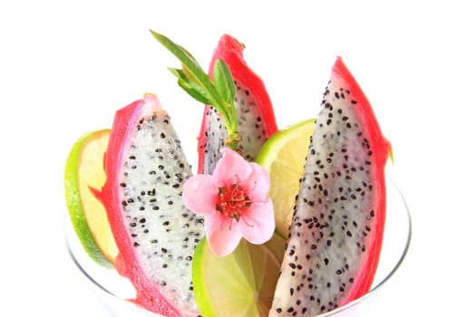 Pitahaya or dragon fruit (Hylocereus undatus) - prepared in a cocktail glass with lime slices