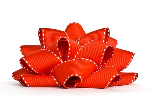 Red grosgrain bow isolated on white background