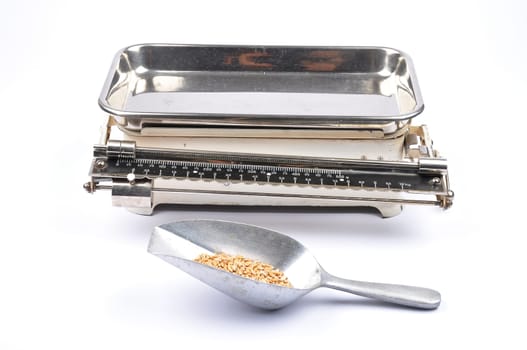 Old kitchen scales on white