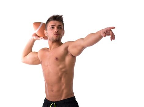 Muscular american football player shirtless ready to throw ball, isolated on white