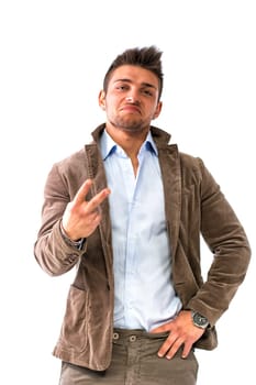 Handsome young man doing 'screw you' sign with two fingers as they do in the UK. Isolated on white