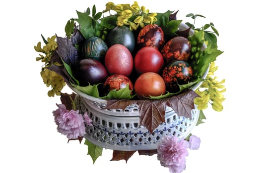 Very beautiful and colorful eggs inside the basket with mirror floor.