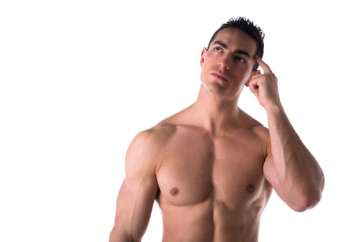 Male muscular shirtless bodybuilder thinking, scratching head with finger