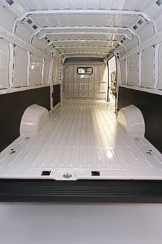 Empty long white delivery van transport