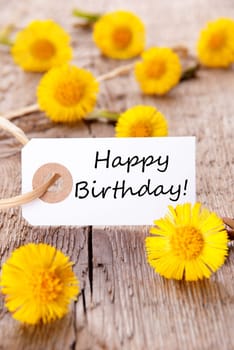 Banner with Happy Birthday and many yellow Flowers