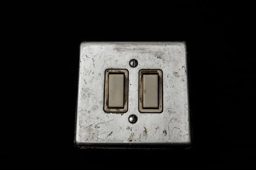 Light switch, old-style on a Black Background