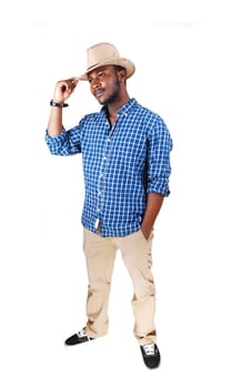 A handsome black man in a blue shirt lifting his cowboy hat and smiling.isolated for white background..