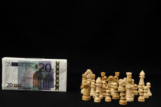Money Strategy Concept White Chess and Currency on a Black Background