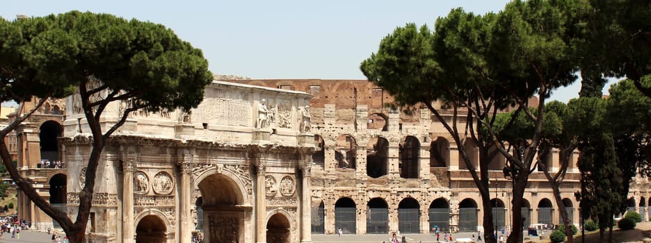 At the Colosseum in Rome,Italy. In the left part of the picture you can see the arch of Constantine.