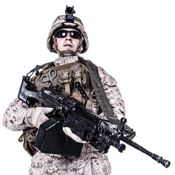US marine with his assault rifle on white background