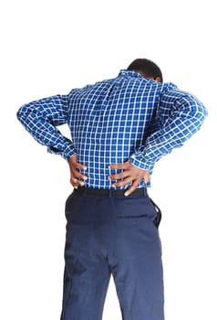 A young black man standing isolated for white background, holding his .hands on his back for heavy back pain..